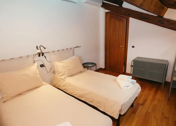 Attico Baggio شقة